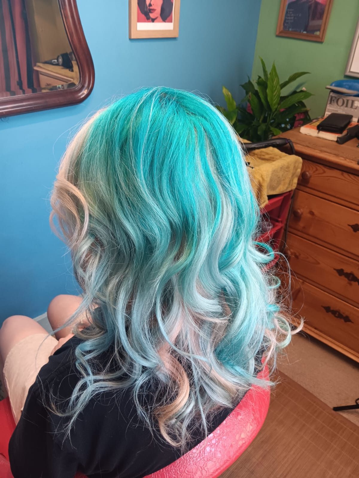 Bright turquoise curls